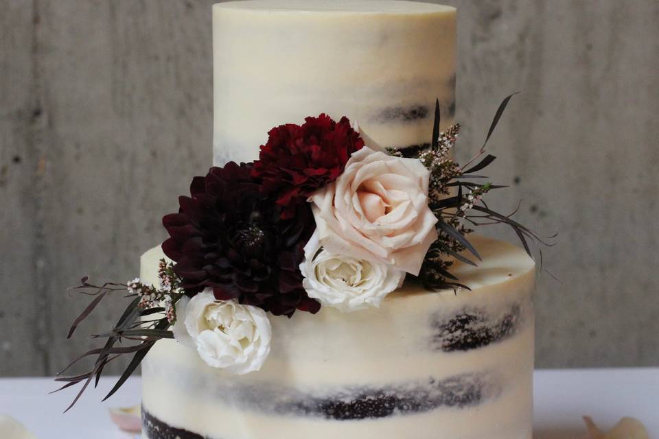 Nearly naked cake with florals