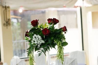 Hope Wedding Centerpiece: Black Magic roses, Green Cybidium Orchids, Queen Anne's Lace, Green Hanging Amaranthus