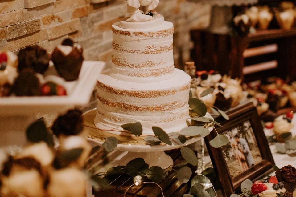 Cake table on stone wall