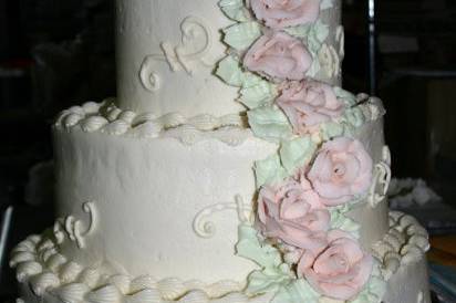 Wedding cake with soft pink flowers