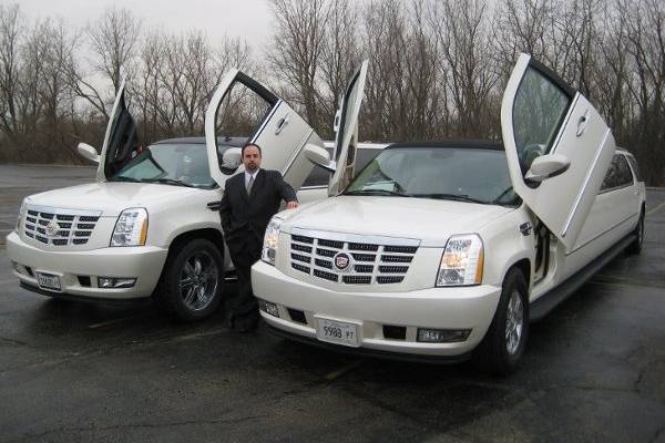 Company owner, Michael Colella, with his new fleet of superstretch Escalades
