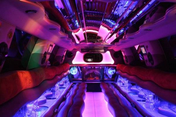 This is the inside of of custom 22 passenger Cadillac Escalade.