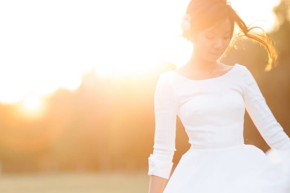 Spinning in the sunset! One of my favorite pictures I have ever taken, she had changed out of her wedding dress and into he reception dress.