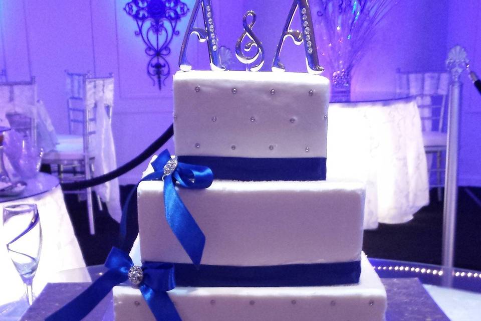 Buttercream Wedding Cake with Blue Ribbon and Bows
