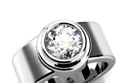 Modern diamond engagement ring.  White gold or platinum.  Bezel set center diamond with brush finished band.