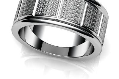 Custom modern men's wedding band with a textured center and polished sides. White gold, platinum, or alternative metals.