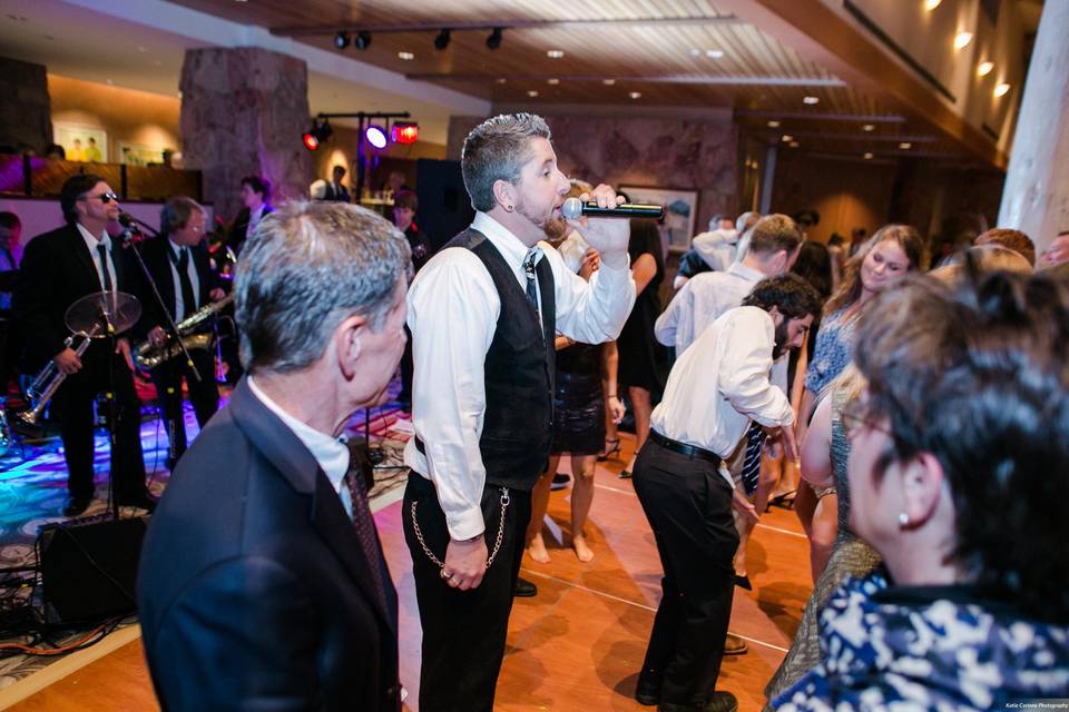 Vocalist Kevin interacts with the wedding guests.