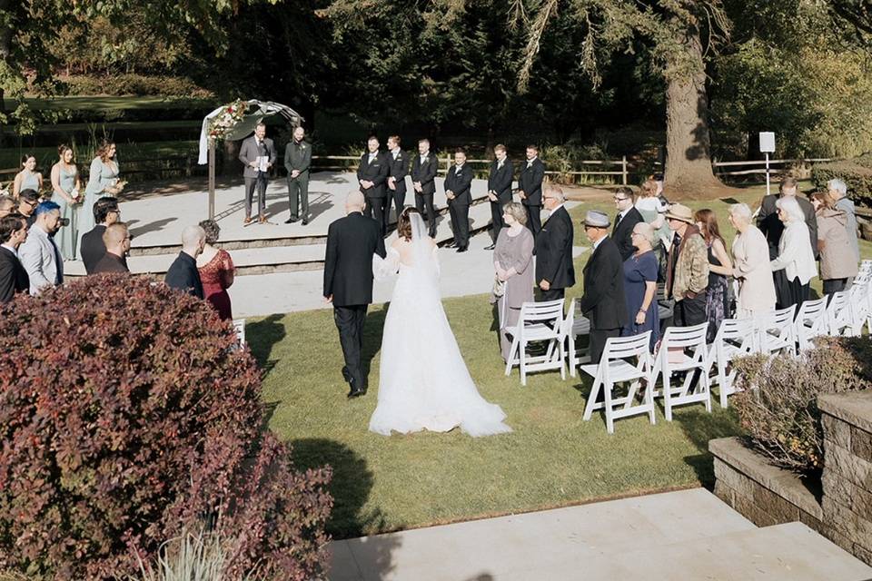 Bride walking down for ceremon