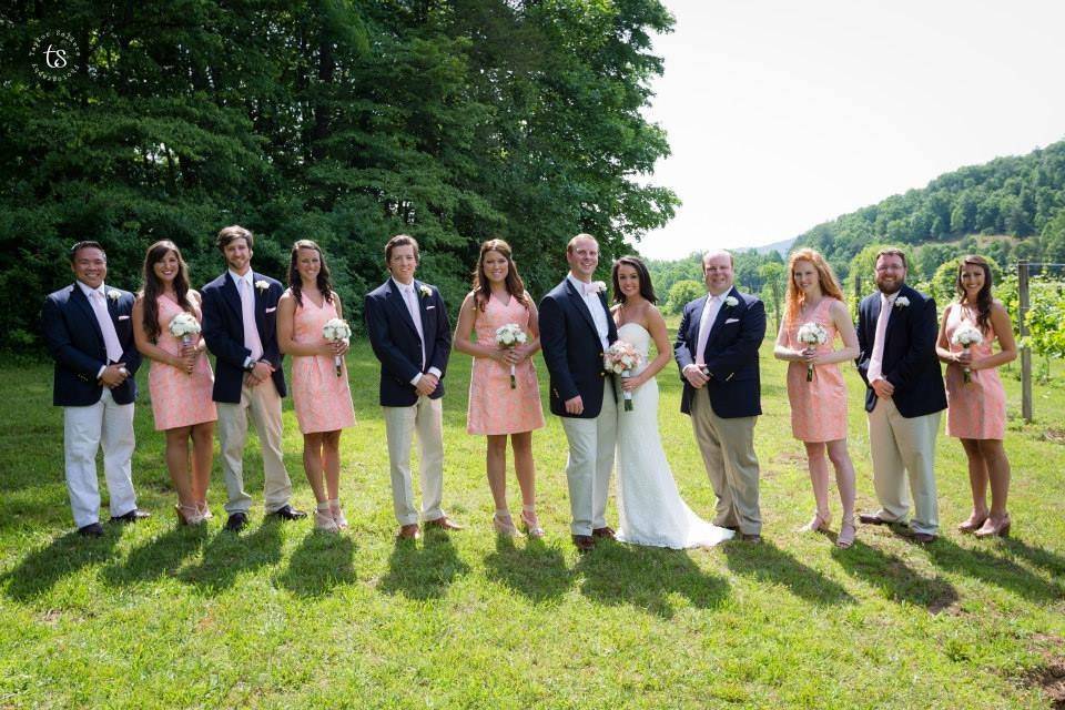 The couple with the bridesmaids and groomsmen