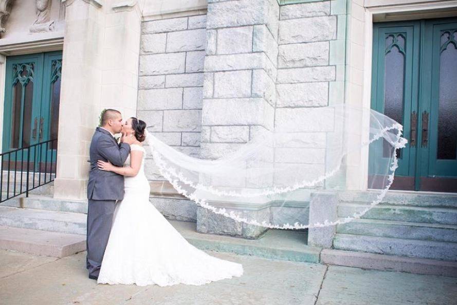 Couple underneath an umbrella