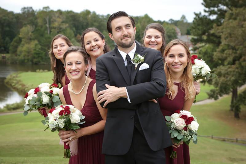 Bridesmaids and groom