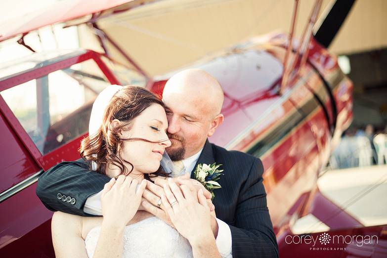 airport wedding reception with vintage airplanes