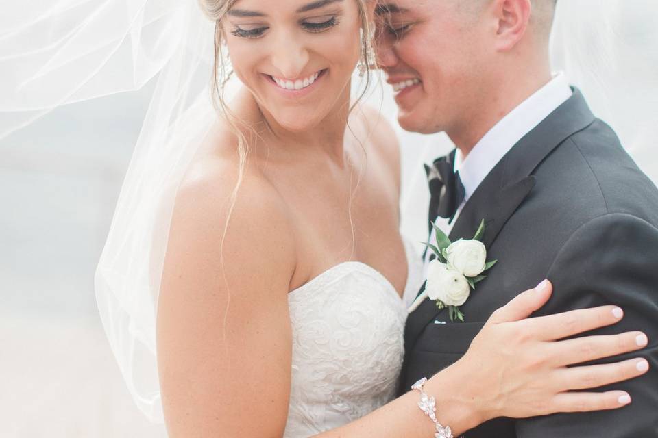 Groom wearing custom tuxedo