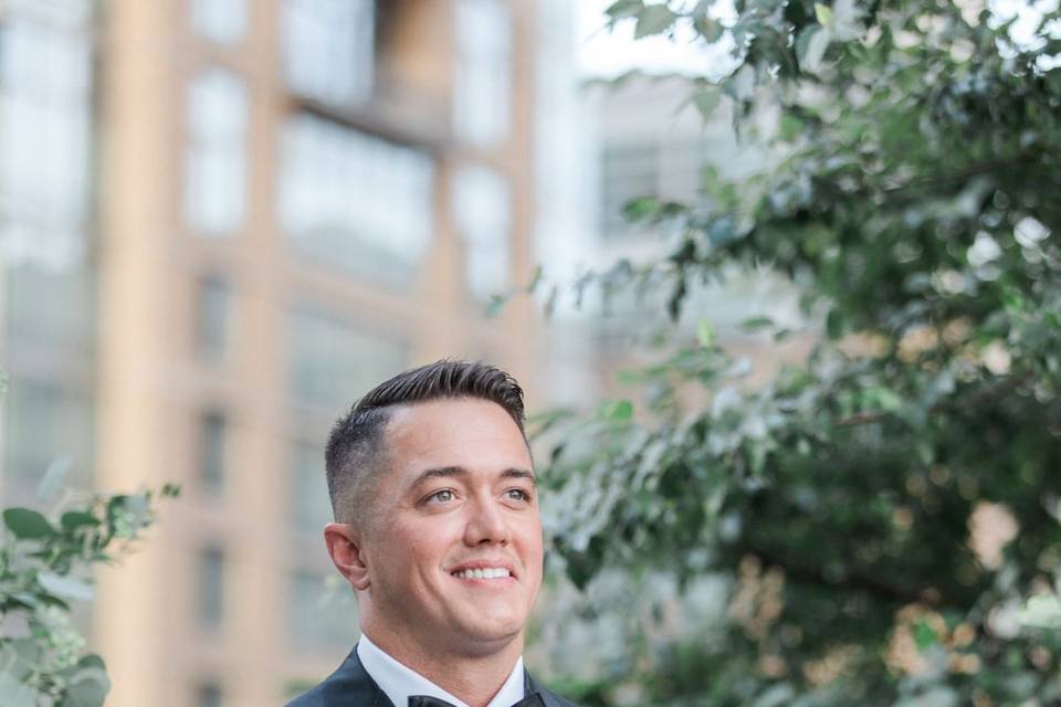 Groom wearing custom tuxedo