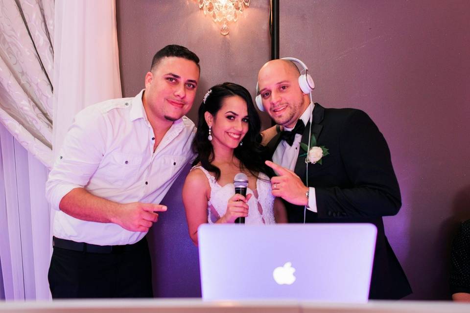 Newlyweds at the DJ booth