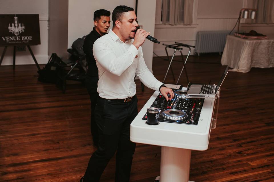 Newlyweds at the DJ booth