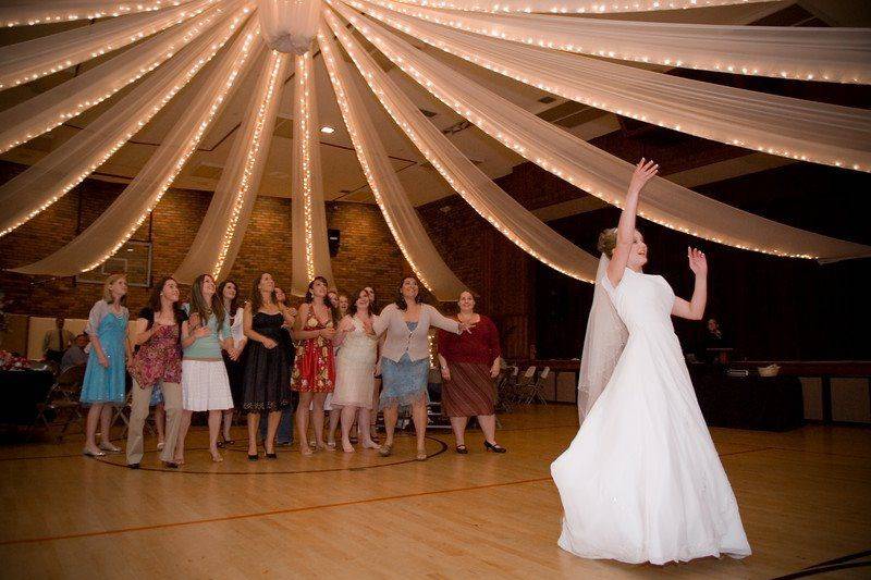 Bride tossing her bouquet