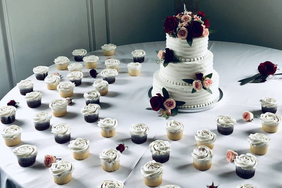 Wedding cake and cupcakes