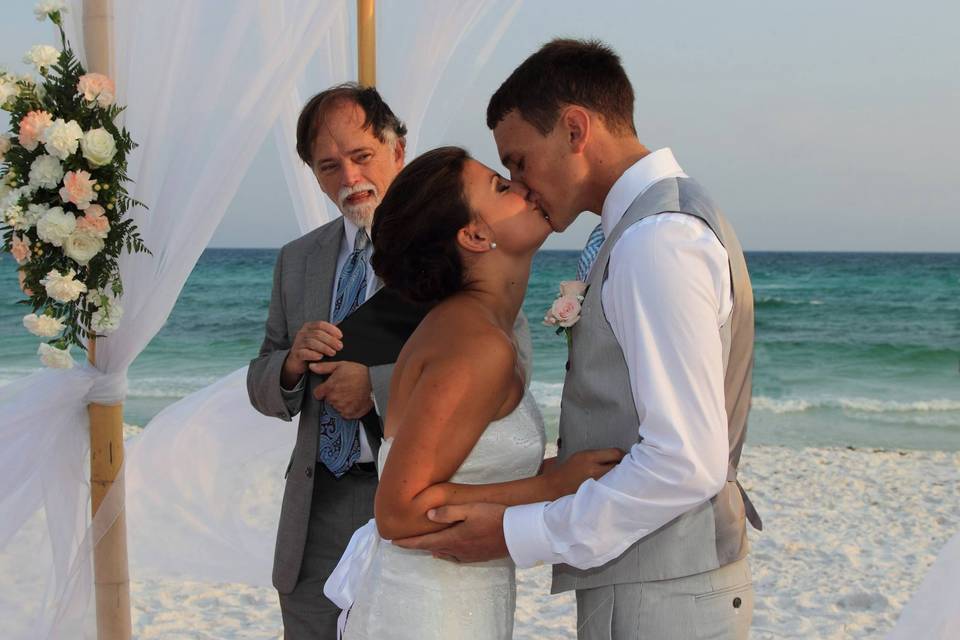 Wedding kiss at the beach