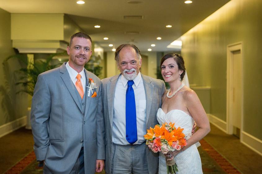 Officiant with the newlywed couple