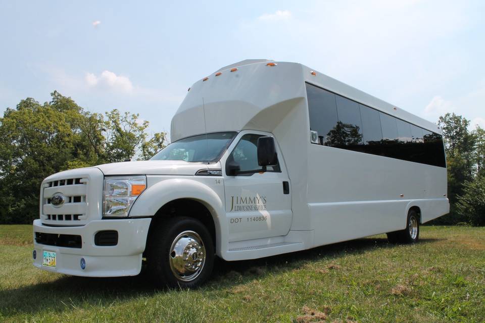 F550 White Limo Bus, same features and benefits as our Black Limo Bus. This vehicle features a rear storage area perfect for boxes of flowers, bags and gifts. 22-24 passengers.