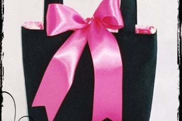 EVENING MINI BAG-approx. 5 x 5 x 2.  My smallest bag-perfect for the bride, bridesmaids, flowergirl & prom!  This tiny bag is the perfect size to carry just what you need...lipstick, compact, credit card, ID, phone...:)
Shown here in black matte satin with hot pink satin ribbon bow.  Has matching lining in hot pink and white.
