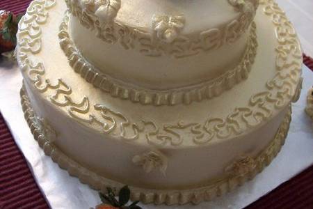 Gold accented small wedding cake