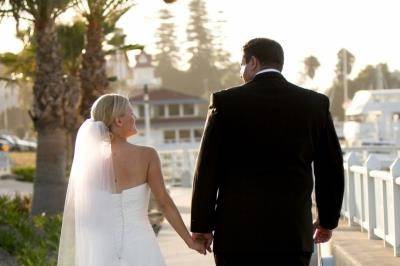 Couple leisurely walk hand in hand