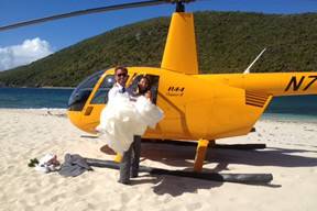 Fly away to a private island via helicopter for your destination wedding in the Virgin Islands. We can add champagne, flowers, photographer, and beach picnic to your wedding day!