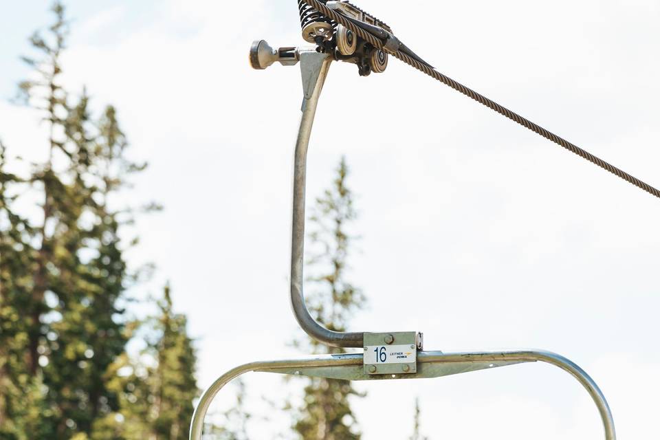 Guest riding the chairlift