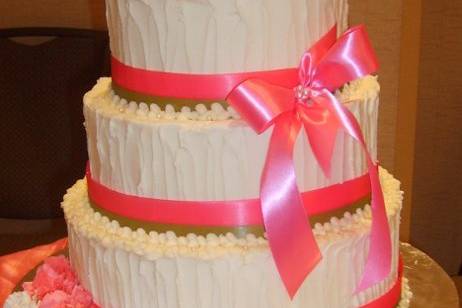 3-tier cake with pink ribbons