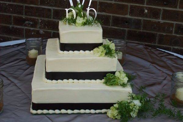 Wedding cake with monogram topper