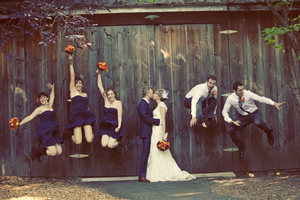 Wedding party outside the barn