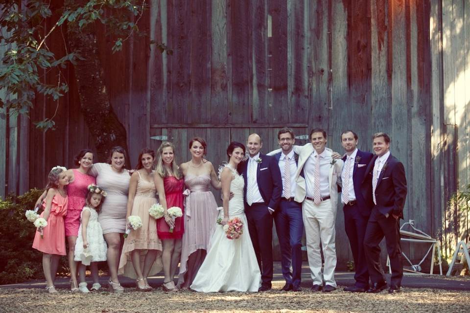 Wedding party in front of the Octagonal Barn