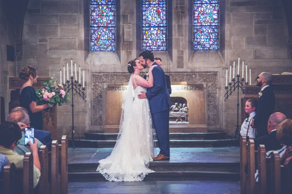 Wedding ceremony kiss