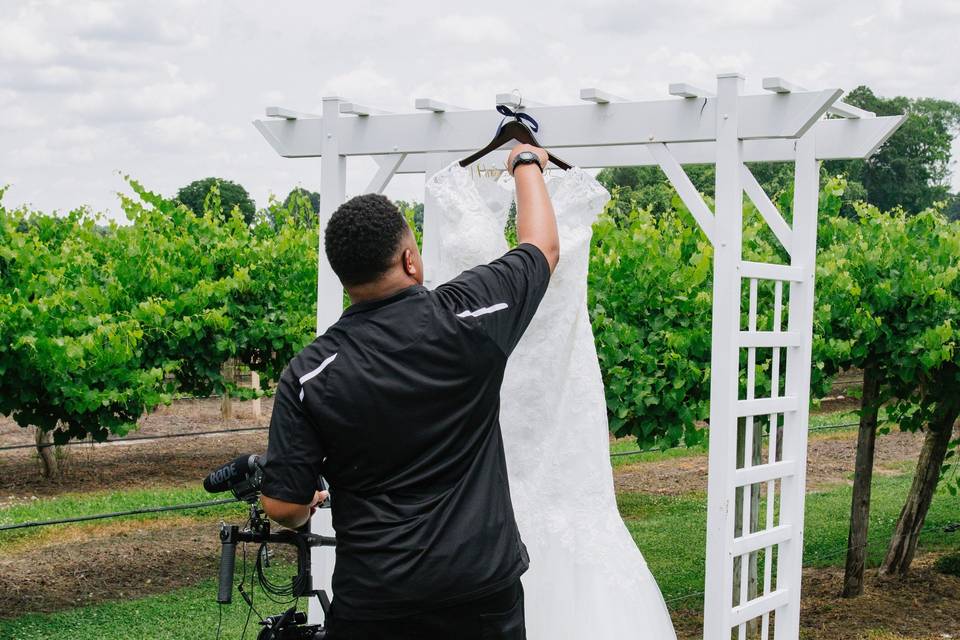 Setting up for a shot of the dress