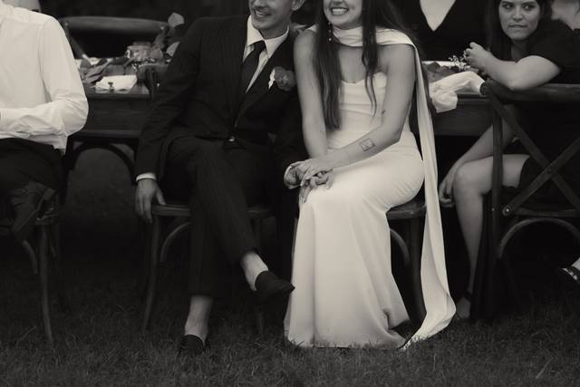 Bride & groom enjoying speeche