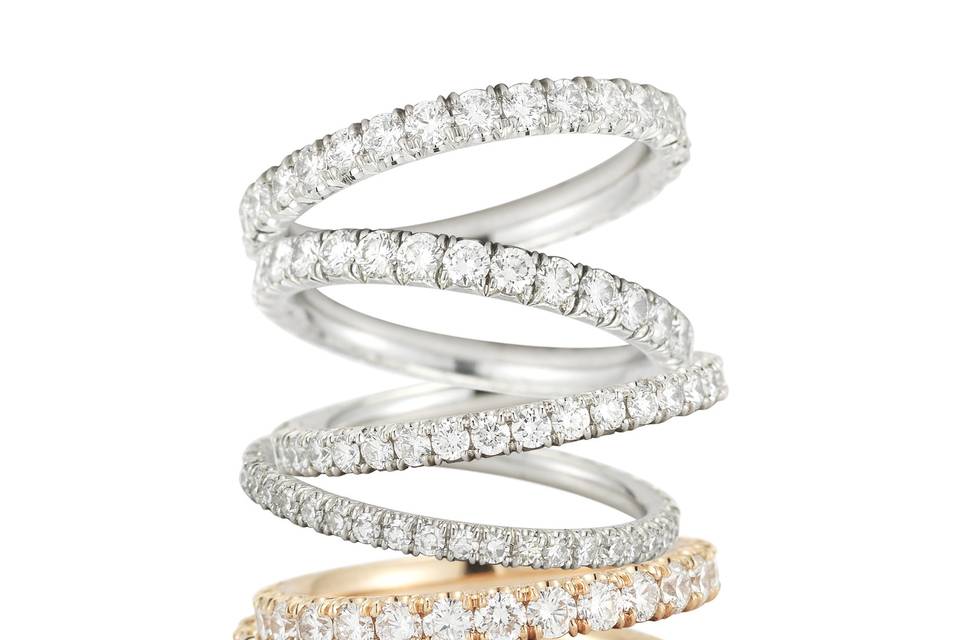 Micro-pave platinum and rose gold wedding bands.