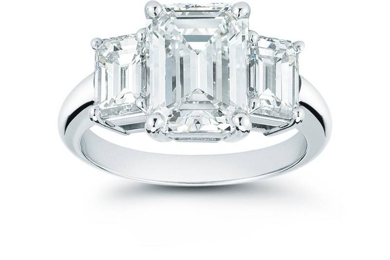 Classic emerald cut three stone elegance!