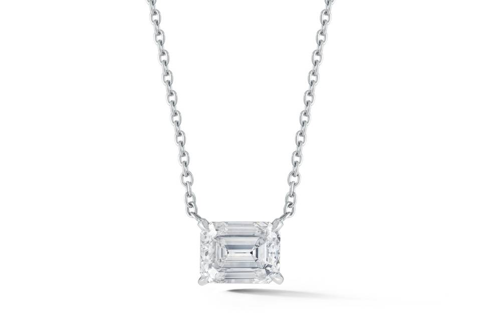 Emerald Cut Diamond PendantA fresh take on the classic solitaire pendant, this horizontally set Emerald cut diamond pendant on platinum chain is just stunning.