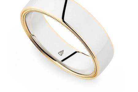 Christian Bauer Two Tone BandThis beautifully designed band is made with 18k yellow gold and platinum. A thin stripe of gold is visible from the top, and milligrain is visible from the sides. 6mm.