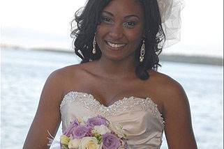 Our real bride here did not want to wear a traditional wedding veil but wanted something unique for her hair.  We designed a simple bridal pouf and she was delighted for her nautical wedding.