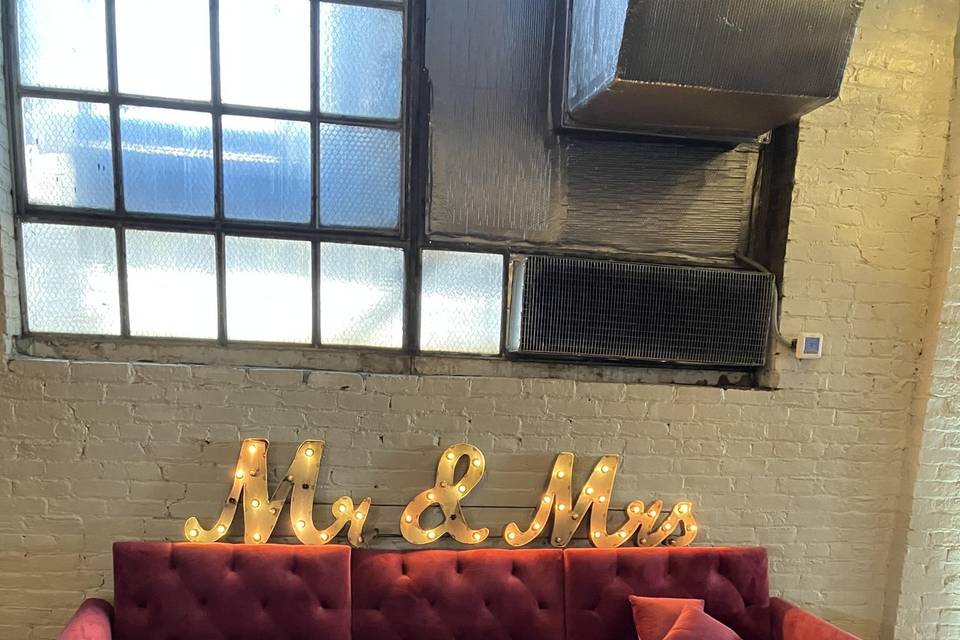 Mr & Mrs sign & sofa