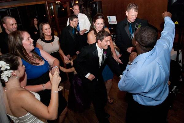 The couple with the bridesmaids and groomsmen