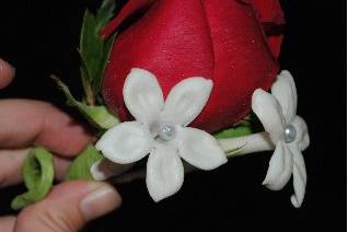 Red rose, stephanotis boutonniere
