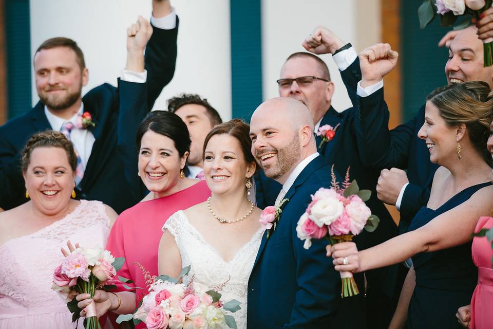 The couple with the bridesmaids and groomsmen