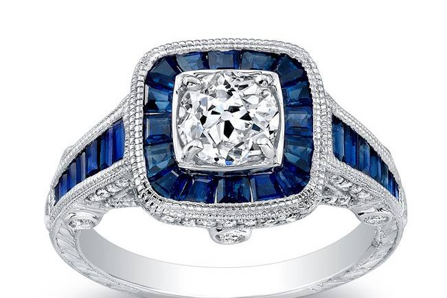Ornate diamond ring with blue stones
