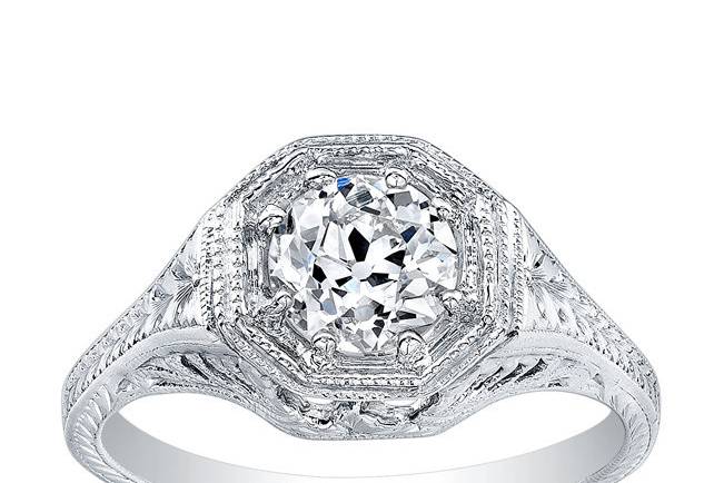 Diamond ring with intricate band