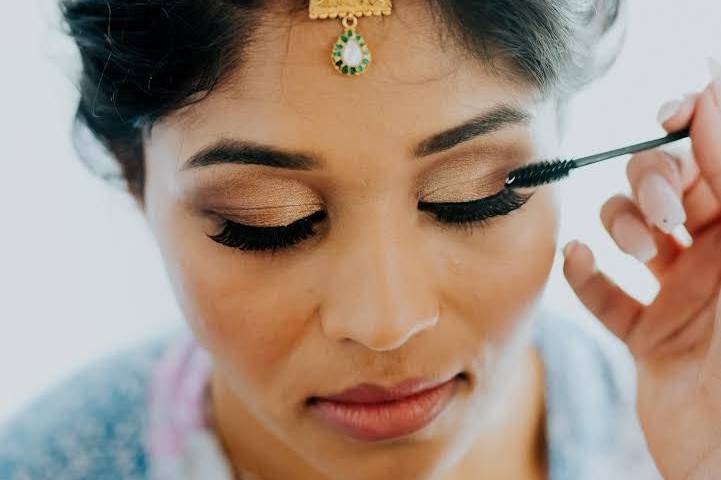 Bride getting her makeup done