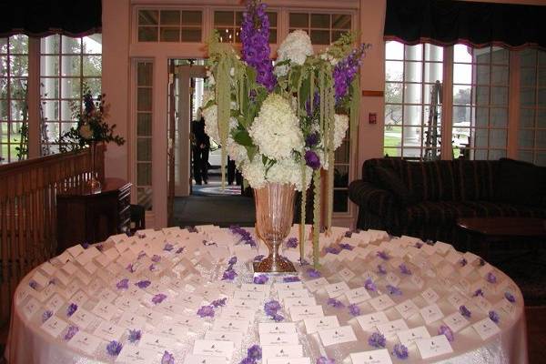 Delphinium and amaranth centerpeice at a country club wedding.